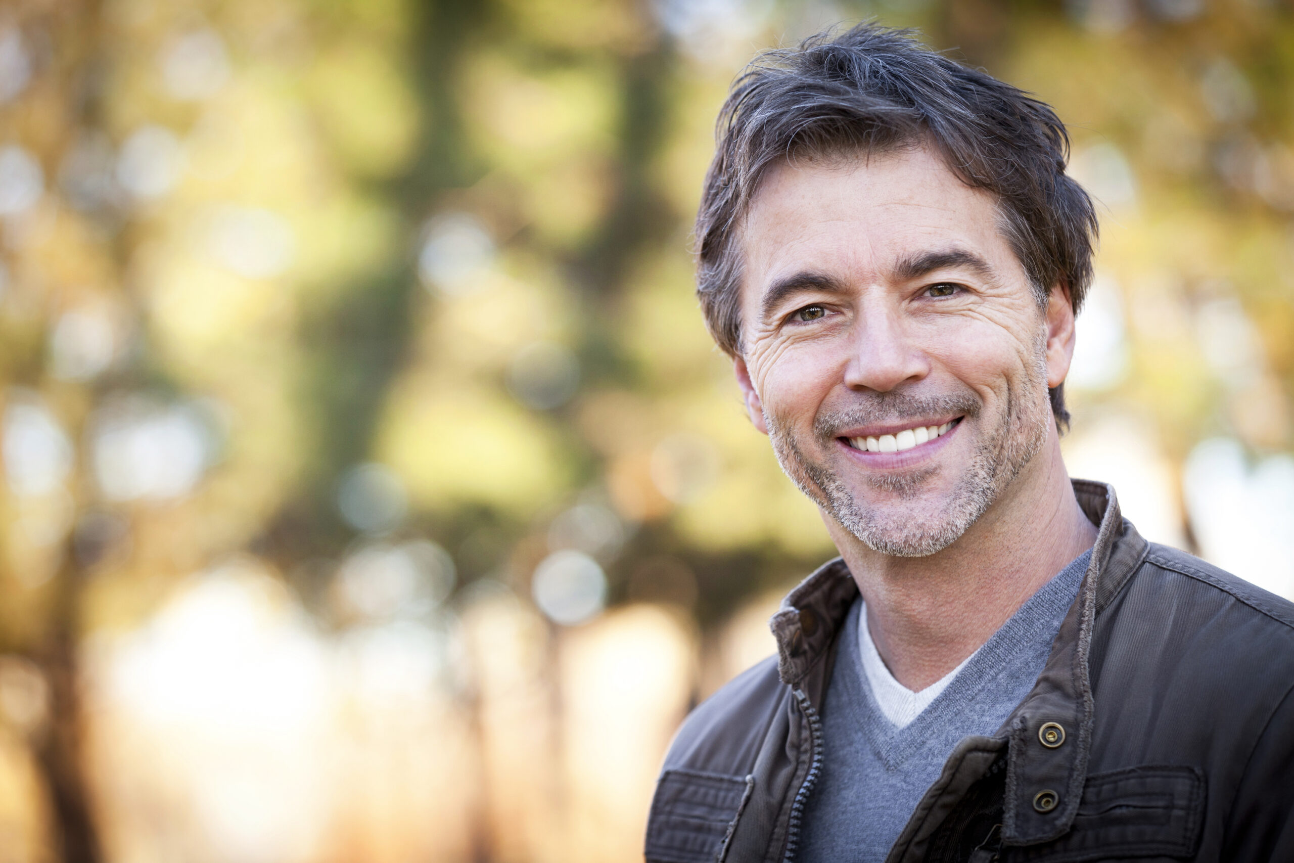 Mature Happy Man Smiling At The Camera