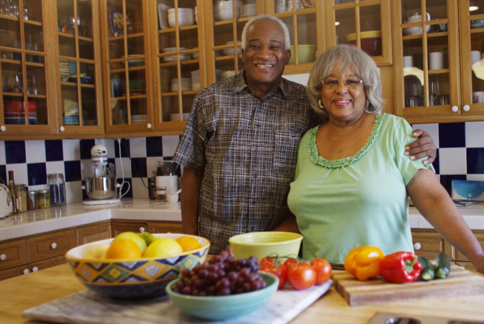 Happy mature couple in the kitchen