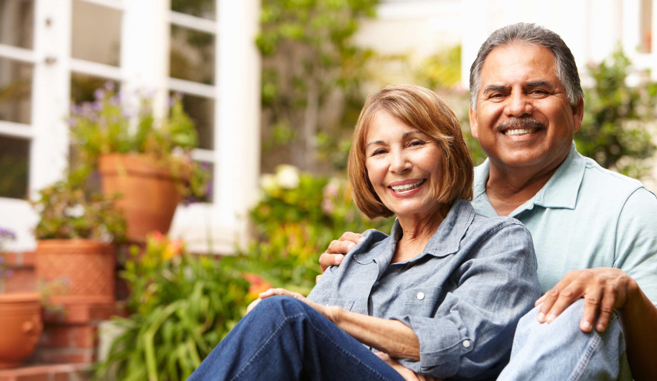 Senior couple relaxing in garden